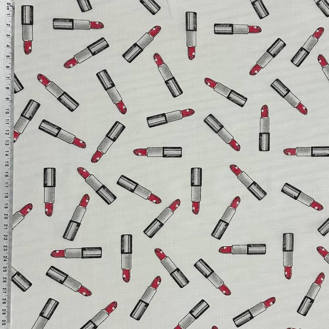 Lipstick on white background | Cotton